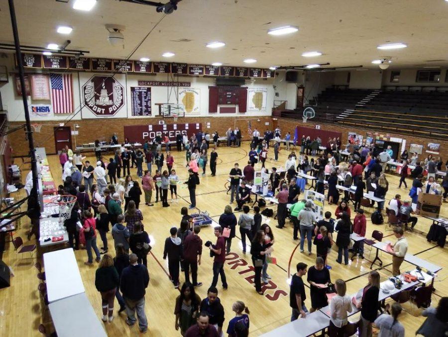 Class of 2021 and parents file in Centrals gym and cafeteria to meet LTHSs many extracurricular activities, sports, and programs.