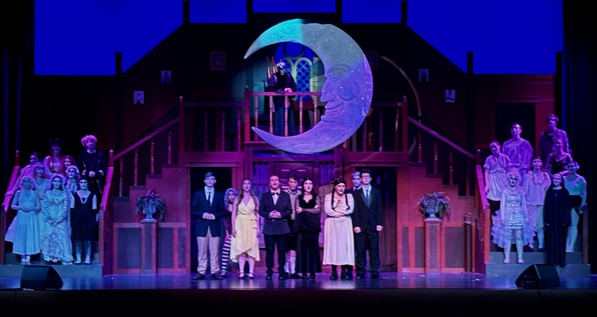 Entire cast, performing "Move Toward the Darkness"