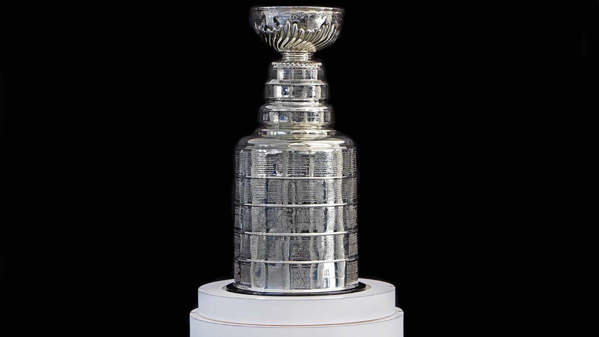 NHL ceremony - Stanley Cup trophy on the white stand, black background, Vancouver BC - October 22, 2018