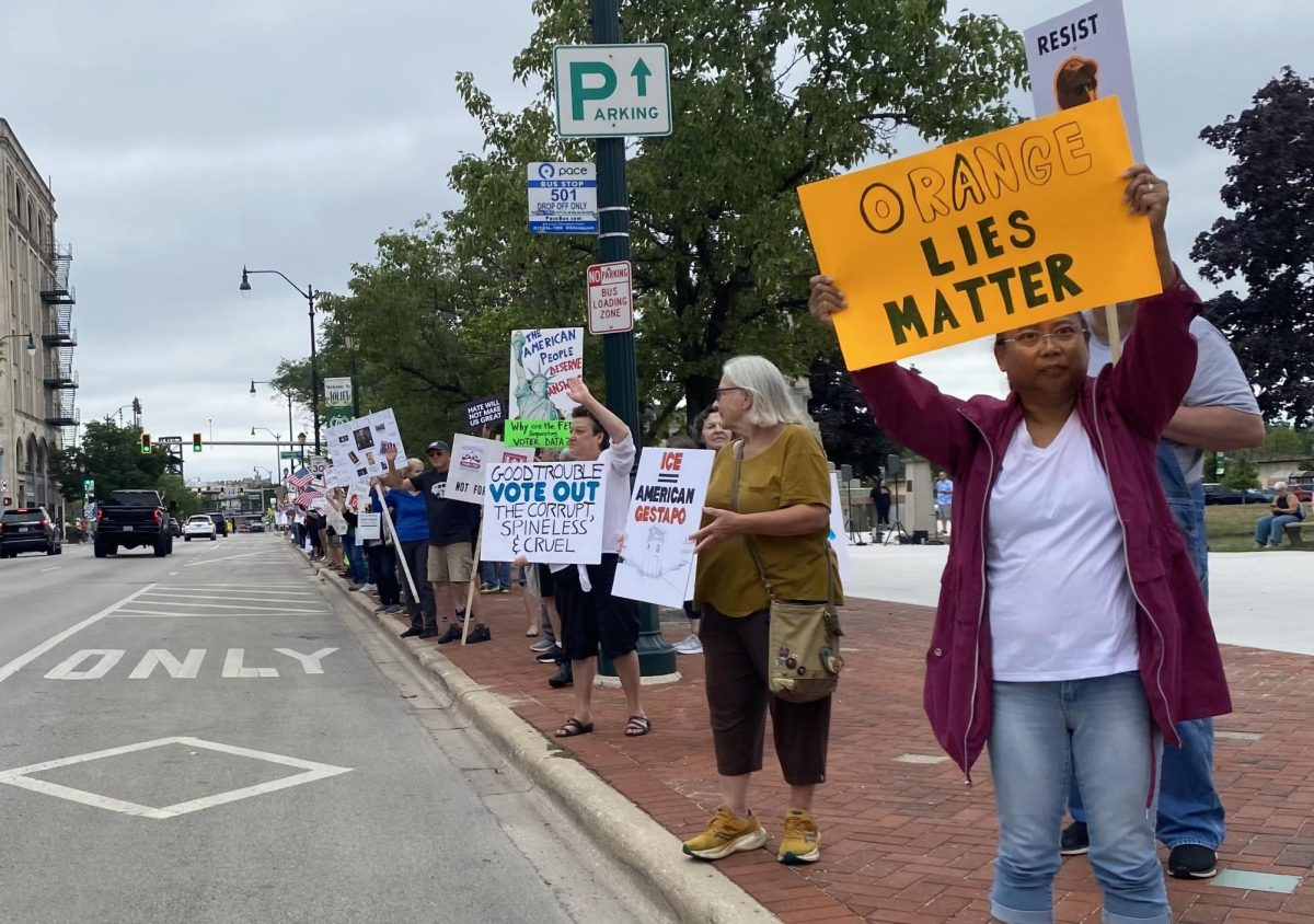Protesters gathered in Joliet Thursday to decry the actions of the Trump administration.