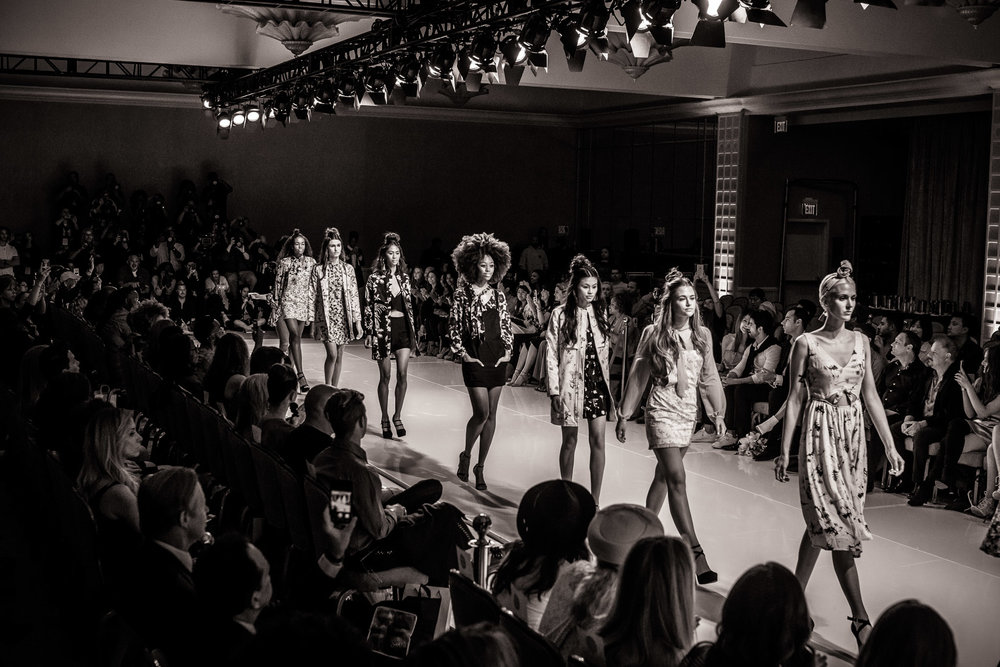 Models walk the runway at New York Fashion Week. 

Accessed via Premium_Paris. CC BY-NC-ND 3.0 US. 