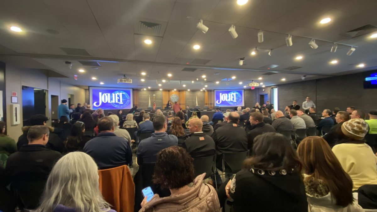 A packed crowd attended the March 16 Joliet City Council meeting. Many residents had to watch the meeting in the City Hall lobby downstairs due to a lack of space. 