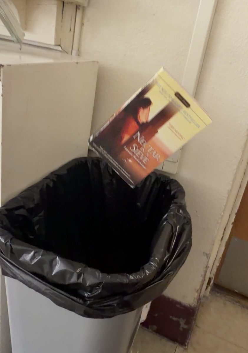 Lockport freshman is eager to throw away her book meant for her English class.